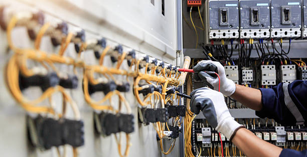 Professional Electrician technician working in Madrid, IA
